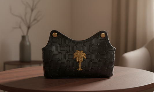 Embroidered tissue dispenser